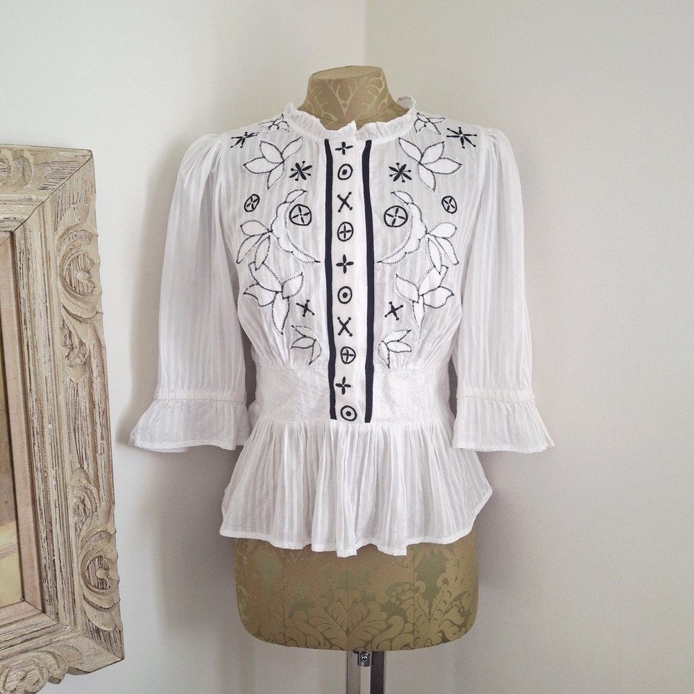 Anthropologie White Peplum Blouse with Black Embroidery